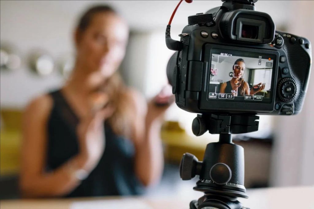 YouTube Affiliate Marketing - The Ultimate Guide - youtube affiliate marketing Affiliate Marketing camera filming the blogger