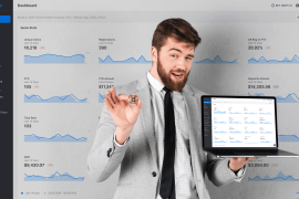 scaleo dashboard - a man holding a laptop with scaleo dashboard